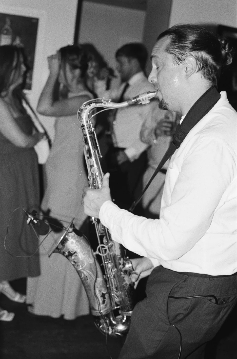 Analogue-style photograph of the wedding saxophonist at The Italian Greyhound