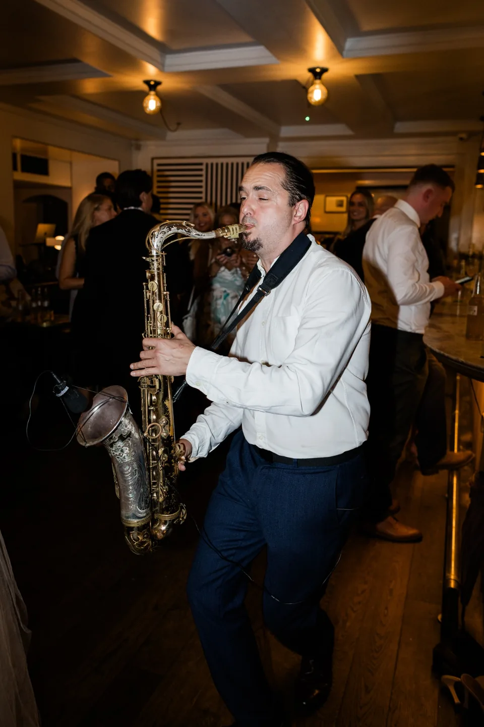 Wedding saxophonist performing at The Italian Greyhound