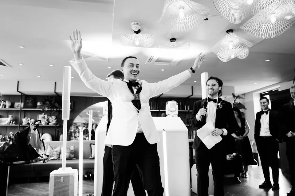 Groom celebrating on the dance floor at a Kitty Hawk wedding in London