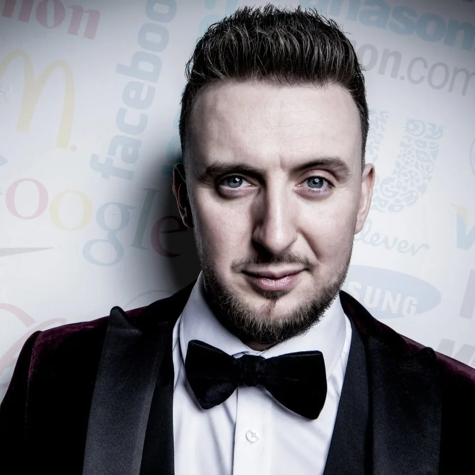 Magician Paul Fowler wearing a bow tie